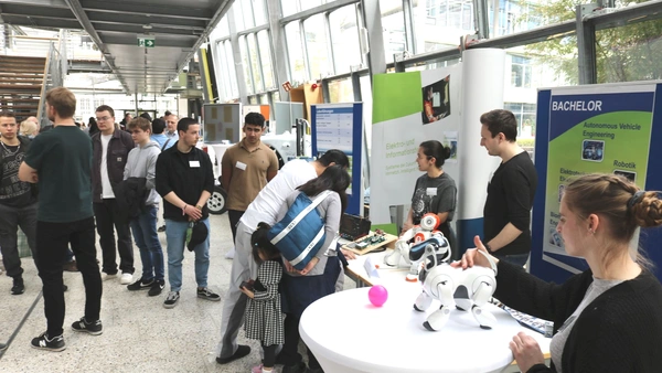 Crowd in the auditorium of the university at the stand