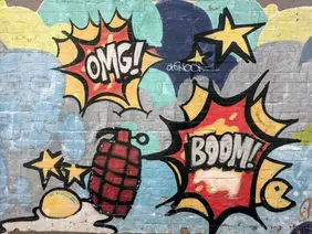 Wall with graffiti - OMG - BOOM